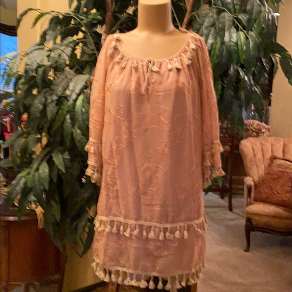Nude stitched long top with tassel trim